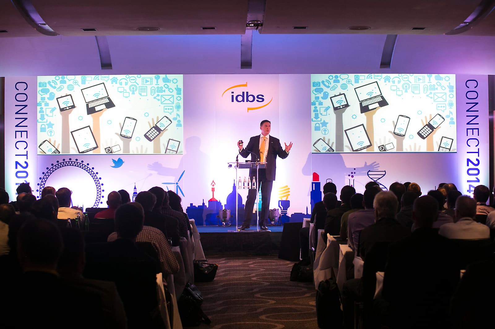 Corporate conference organized by BRANDING-LY with professional stage setup and audience engagement